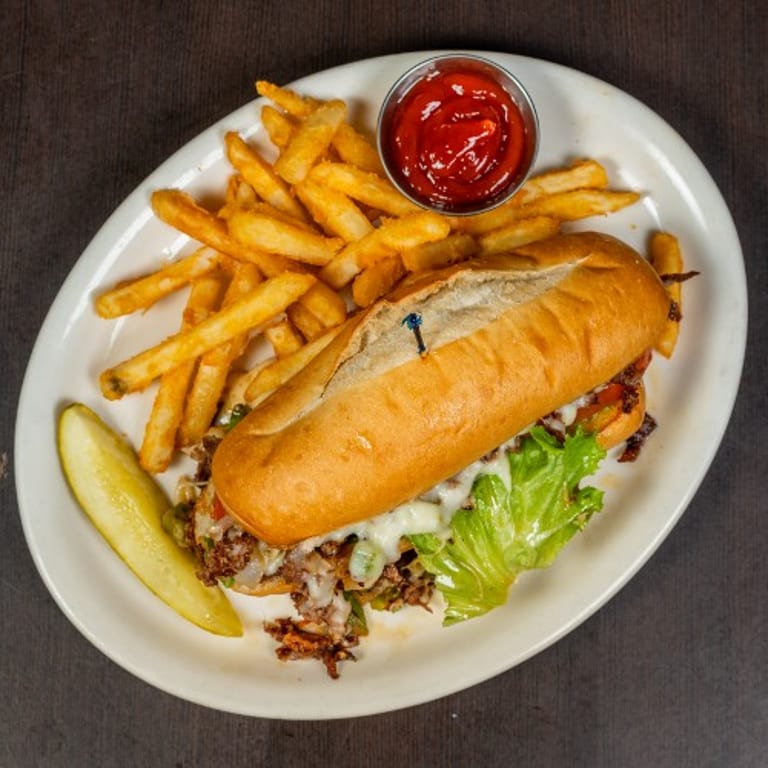 Indulge in Our Cheesesteak